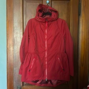 Lululemon Rain for Daze 2 raincoat with peplum detail. Size 6. Color Prep Red